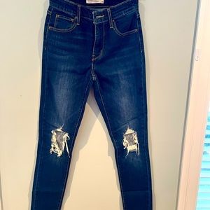 Levi’s lightly distressed jeans
